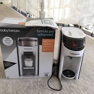 SOLD!!! New and improved Baby Brezza formula pro